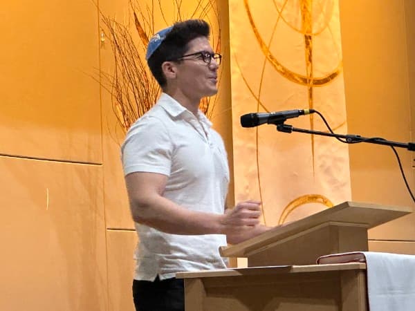 Speaker at the podium during the Abraham's Bridge event